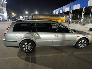 ваз лада 4: Ford Mondeo в кузове универсал серебристого цвета. басы 430000 жылы