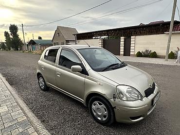 byd e1: Toyota Yaris: 2002 г., Автомат, Бензин, Хэтчбэк — 5