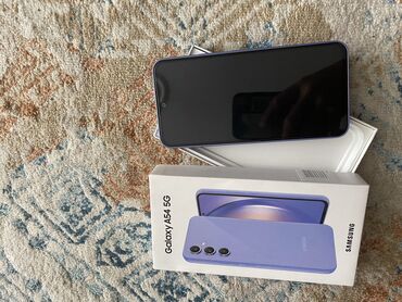 Мобильные телефоны и аксессуары: Samsung Galaxy A54 5G, 256 ГБ, цвет - Фиолетовый, Отпечаток пальца, Две SIM карты, Face ID