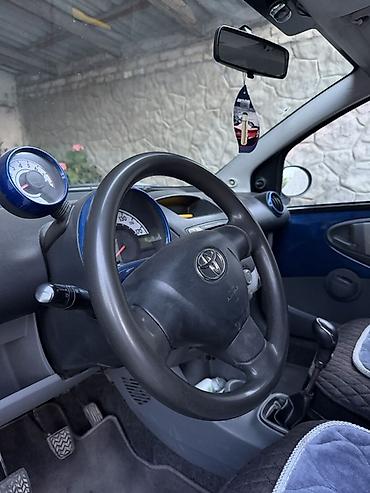 тайота арис: Toyota Aygo: 2009 г., Механика, Бензин, Хэтчбэк — 5