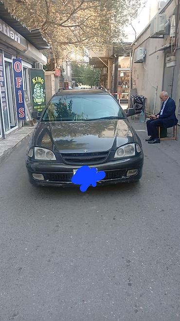 cesqa masin: Toyota Carina E Universal (station wagon) - Kuzov: universal, qara — 1