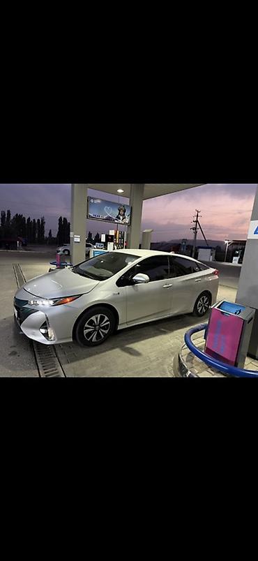 roewe ei5 2021: Toyota Prius: 2017 г., Гибрид, Хэтчбэк — 2