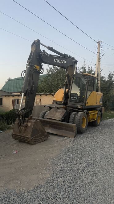 купить вольво тандем в европе: Экскаватор, Колесный