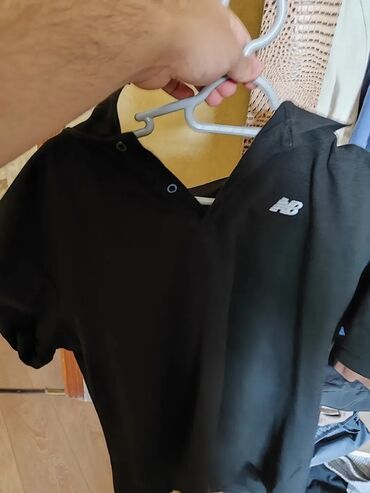 Polo köynəklər: Satilir beyler ucun new balance firmasinin polo futbolkasi veziyyeti