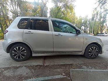 Транспорт: Mazda Demio: 2004 г., 1.3 л, Автомат, Бензин, Хэтчбэк — 4