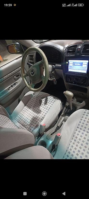 cx 9: Mazda Demio: 2000 г., 1.5 л, Автомат, Бензин, Минивэн — 8