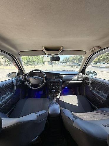 forut satsi: Opel Vectra: 1.8 l | 1999 il 303000 km Sedan — 3