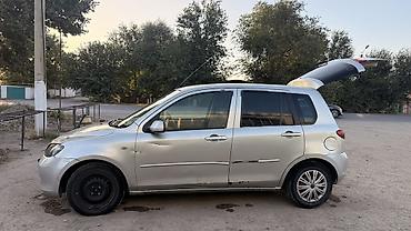 мотоцикл полуавтомат: Mazda Demio: 2004 г., 1.3 л, Автомат, Бензин, Хэтчбэк — 5