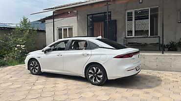e2 byd: Электромобиль GAC Aion S, белый седан. Основные характеристики и — 5