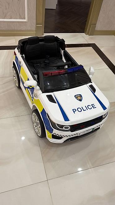 Uşaq üçün elektrik maşınları: Uşaq üçün elektrikli polis maşını - Dizayn: Ağ rəngli kuzov — 1