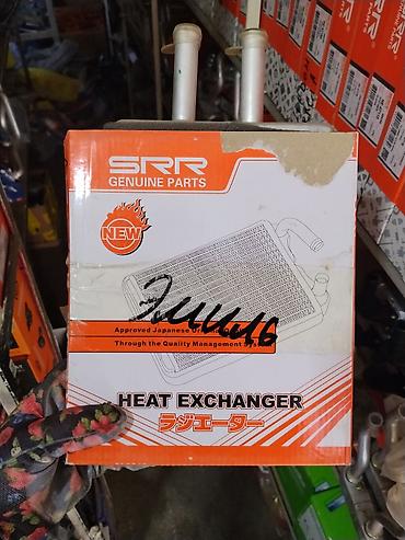 Радиатор отопителя (теплообменник) SRR Genuine Parts - Назначение
