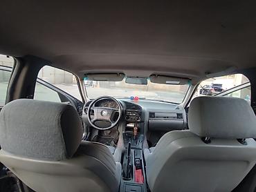 BMW: BMW 3 series: 1.8 l | 1994 il Sedan — 7