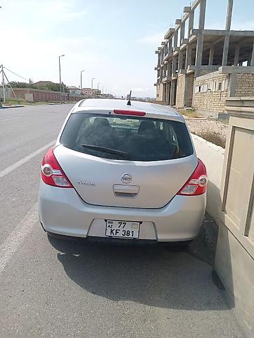 07 satşı: Nissan Tiida, gümüşü rəng, hatchback kuzov. Əsas xüsusiyyətlər: - — 1