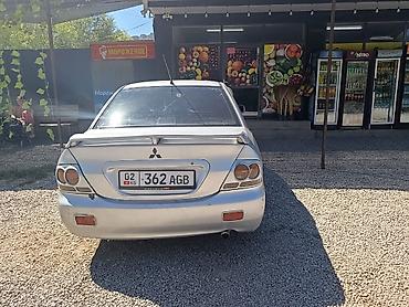 sl 55: Mitsubishi Lancer: 2005 г., Механика, Бензин, Седан — 3