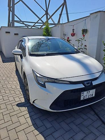 elit ehtiyat hisseleri: Toyota Corolla Touring Sports Hybrid – universal kuzovlu, ağ rəng — 8