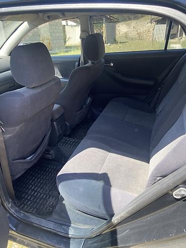 rota grid: Toyota Corolla: 2002 г., 1.6 л, Механика, Бензин, Хэтчбэк — 1