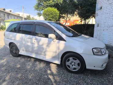 электирик машина: Продается минивэн Nissan Liberty белого цвета. Автомобиль имеет