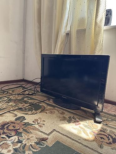 круглый: Телевизор Panasonic, диагональ около 32". Плоская панель, настольная — 1