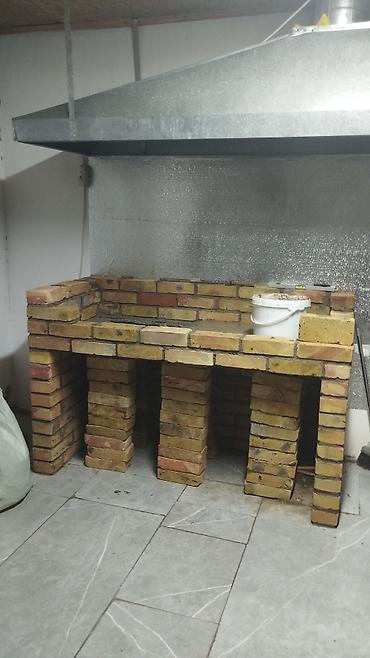 Печной комплекс из кирпича под вытяжным зонтoм - Кладка из