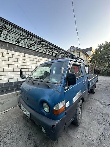 портер двух скат: Грузовой бортовой Hyundai Porter синего цвета. Компактный коммерческий — 1