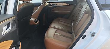 GAC: GAC Aion S — современный электрический седан белого цвета. Зопас хода — 8