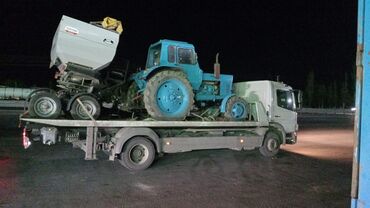 masin ucun uzlukler: Eskavator daşımaq üçün nəzərdə tutulmuş platformalı yük maşını
