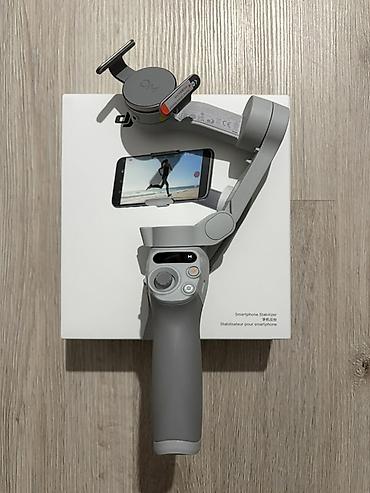 Стабилизатор для смартфона DJI Osmo Mobile SE, в идеальном состоянии