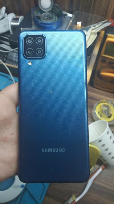 samsung e1170: Samsung Galaxy A12, 64 GB, rəng - Göy, Zəmanət, Düyməli, Sensor