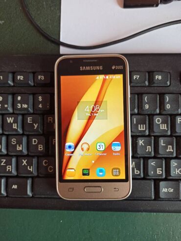 Samsung: Samsung Galaxy J1 Mini, 8 GB, rəng - Qızılı, İki sim kartlı — 1