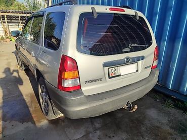 варианты: Mazda Tribute: 2002 г., 2 л, Механика, Бензин, Кроссовер — 10