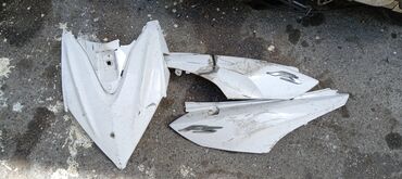 xirdalan korpusu: Moped üçün ağ rəngdə olan plastik korpus hissələri. Bu hissələr