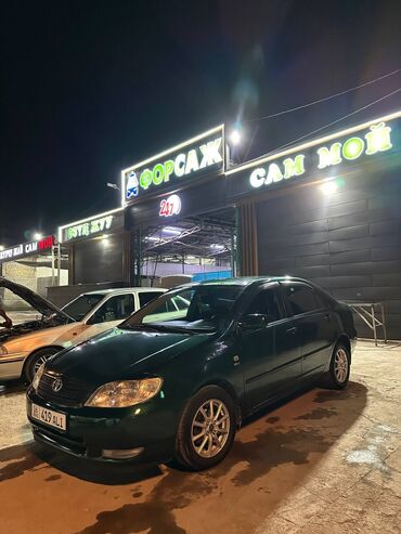 бампер на опель вектра б: Toyota Corolla седан, тёмно‑зелёный цвет. Кузов и экстерьер: -