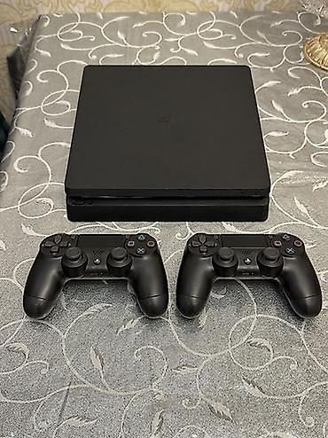 ps4 konsole: PlayStation 4 Slim oyun konsolu dəsti 500 ə qədər oyun var 2 pult var — 1