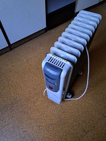 масленные обогреватель: Масляный обогреватель Vitek, Кол-во секций: 10 и более, Отключение при перегреве