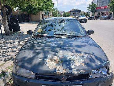 prius teker: Mitsubishi Lancer: 1.3 l | 1997 il Sedan — 4