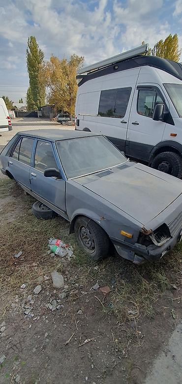 323 автомат: Mazda 323: 1983 г., 1.3 л, Механика, Бензин, Хэтчбэк — 9