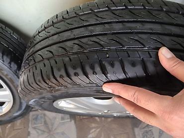 w210 disk: İşlənmiş Disk təkər Nissan 195 / 65 / R 15, 4 Boltlu — 3