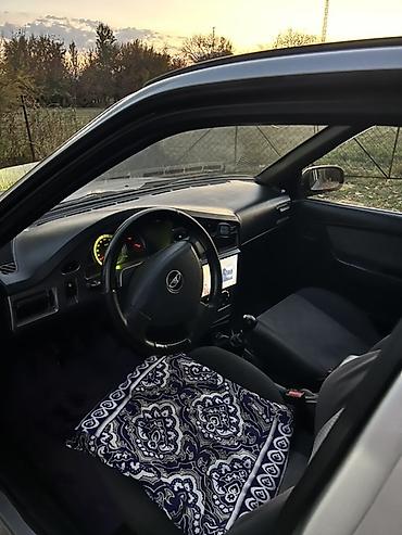 митсубиси спайк стар: Daewoo Nexia: 2012 г., Седан — 10