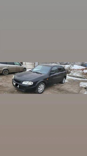 Mazda: Mazda 323: 2000 г., 1.8 л, Механика, Бензин