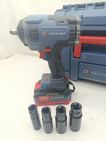 Инструменты: Аккумуляторный ударный гайковерт Excalibur 1/2" Описание: - Мощный — 3