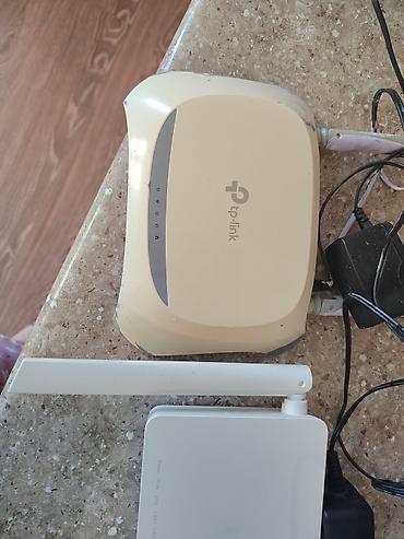 router 2 antenna: İki ədəd Wi‑Fi router/ONU dəsti 1) TP‑Link router - İki xarici — 1