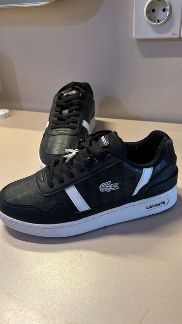 женские белые кроссовки: Məhsul: Lacoste T-Clip idman ayaqqabısı(orginaldır) - Rəng: qara, ağ