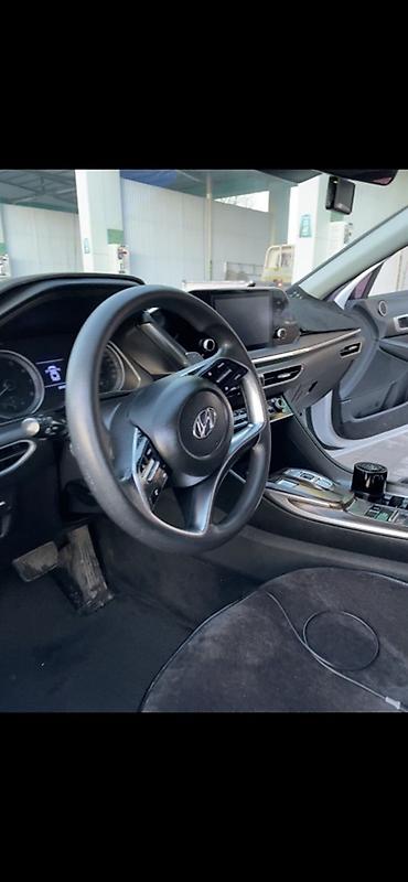 byd e9 1: Элегантный белый седан бизнес‑класса с динамичным купеобразным — 2