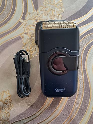 akumulator satisi: Kemei KM-T389 elektrik ülgüc iki ağızlı üz qırxan,alınıb hec — 4
