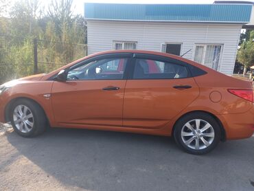 купить двигатель д 245: Седан Hyundai Solaris оранжевого цвета, с хромированной решеткой