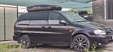 холодильник авто: Kia Carnival: 2000 г., 2.5 л, Автомат, Газ, Минивэн — 2