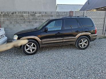 буксиры: Mazda Tribute: 2004 г., Автомат, Газ, Кроссовер — 1