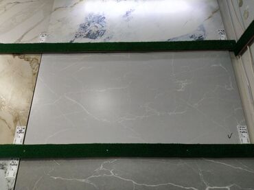 Metal məhsulları: Böyük ölçülü keramoqranit plitə - Rəng: açıq-boz - Naxış: mərmər