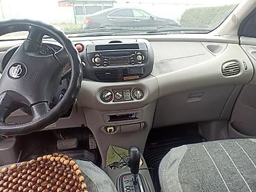 Унаа: Nissan Almera Tino: 2000 г., 1.8 л, Вариатор, Газ, Вэн/Минивэн — 9