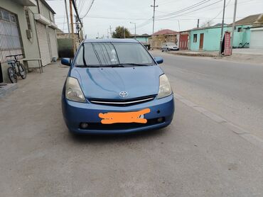 Toyota: Toyota Prius (2-ci nəsil) hibrid hetçbek,7 düyməyaxşı vəziyyətdədi — 2